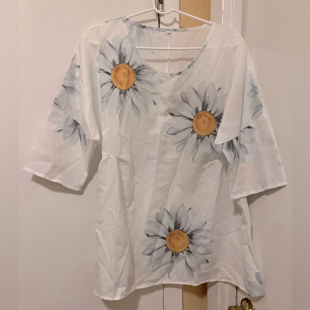 2 woman’s Size Large tunic shirts. Never Worn.